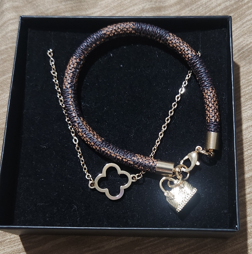 Elegant Gold and Black Bracelet